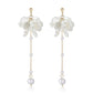 Kruckel Pearl Flower Long Drop Earrings in sterling silver with white pearl blossoms, lightweight hypoallergenic dangle earrings
